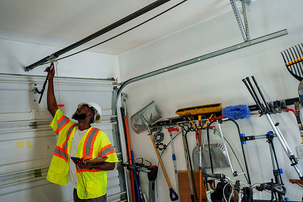 Professional Garage Door technician working in Ames, TX